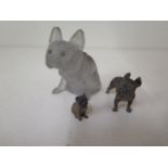 Two cold painted bronze pug dogs, 4cm tall x 5cm long and 5cm tall and 2.5cm long, some paint losses