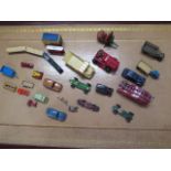 An assortment of diecast vehicles including Dinky, Matchbox, Crescent Toy BRM Mk2, one matchbox tram