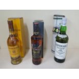 A 70cl bottle of The Famous Grouse smoky black blended Scotch whisky, a 70cl bottle of