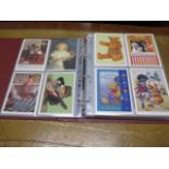 An album of approximately 170 reproduction advertizing postcards, all in good condition