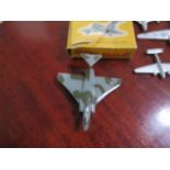 Nine Dinky toys aircraft, one boxed, three missing propellers but all original paint and some wear