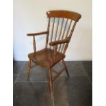 A 19th century ash and elm stick back armchair, 102cm tall x 46cm wide x seat height 44cm, with a