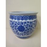 A blue and white Carp bowl / planter, 28cm tall x 30cm wide, in good condition