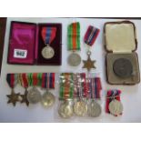 Ten unnamed WWII medals, a boxed faithful service medal to Rebecca Hatton Wilkinson and a 1926