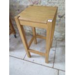 An oak stool, 76cm tall, in good condition