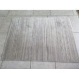 A modern rug, 170cm x 125cm