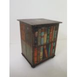 A 1905 Huntley and Palmer 'Bookstand' biscuit tin, hinged lid to top, bookstand fitted with books on