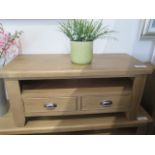 A good quality oak TV cabinet, 110cm wide, new ex-display retails at £269