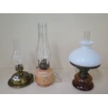 Three small oil lamps, tallest 36cm tall, all generally good, wicks work
