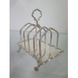 A silver toast rack, Birmingham 1910/11, Hukin and Heath, 11cm long, approx 5.8 troy oz, no