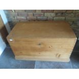 A 19th century stripped pine storage box with two small internal drawers and key, 54cm tall x 94cm x