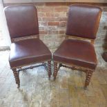 A pair of Oak upholstered side chairs