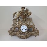 A French painted spelter figural mantle clock with porcelain plaques, 39cm tall x 42cm wide, for