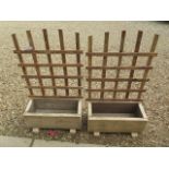 A pair of rustic trellis planters, 103cm tall x 66cm x 31cm deep