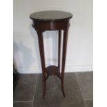 A circa 1900's mahogany plant stand, bares a label for F Thomas, Cabinet maker 'Halesowen', 93cm