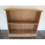 A Victorian stripped pine open fixed shelf bookcase, 119cm tall x 127cm x 37cm