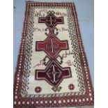 A natural dyed woven Persian full pile quashqi nomadic rug cross door design, signed, 218cm x 118cm