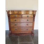 A Victorian mahogany Scottish chest with a serpentine fronted drawer above five further drawers on a