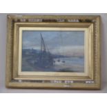 Charles W Wyllie 1859-1923 signed oil on canvas fishing boat on shore, in a gilt frame, frame size