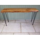 A new naturalistic wooden live edge wooden hall table on metal supports, 77cm tall x 137cm wide x