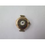 A 9ct gold trench type manual wind watch 2.5cm wide, no strap or glass but running hands advance,