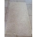 A modern shag pile rug, Tentakel, made in India, 100cm x 200cm, sold by the Real Rug Company