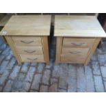 A pair of oak effect three drawer bedside chests, 57cm tall x 50cm x 40cm, generally good some marks