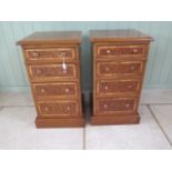 A pair of four drawer mahogany bedside chests made by a local craftsman incorporating old timbers,