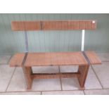 A mahogany and steel garden bench made by a local craftsman, 89cm tall x 108cm wide x seat depth
