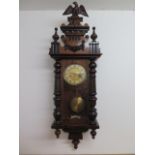 An Austrian 8 day striking wall clock, 94cm tall, in running order