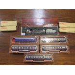 A Liliput HO gauge loco with tender, 5 coaches and 4 lighting sets, all boxed