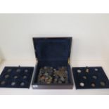 A collection of Georgian and later coins and tokens in a collectors box