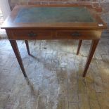 An Edwardian 2 drawer Mahogany writing table 74 cm tall 84 x 49
