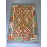 A hand knotted woollen Chobi Kilim rug, 122cm x 83cm