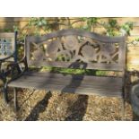 A weathered cast iron sunflower back wooden slatted bench, 127cm wide