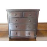 A Victorian mahogany miniature chest of two over three drawers, 31cm x 30cm x 17cm, in polished