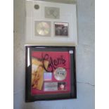 Two framed Platinum Sales Awards John Cougar Mellencamp Scarecrow and Gloria Estefan Greatest