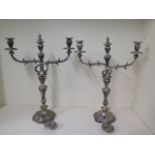 A pair of impressive twin branch silver plated candlesticks, 59cm tall x 45cm wide, with sconces for