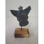 A metal figure on stand, 10cm tall, with patinated finish