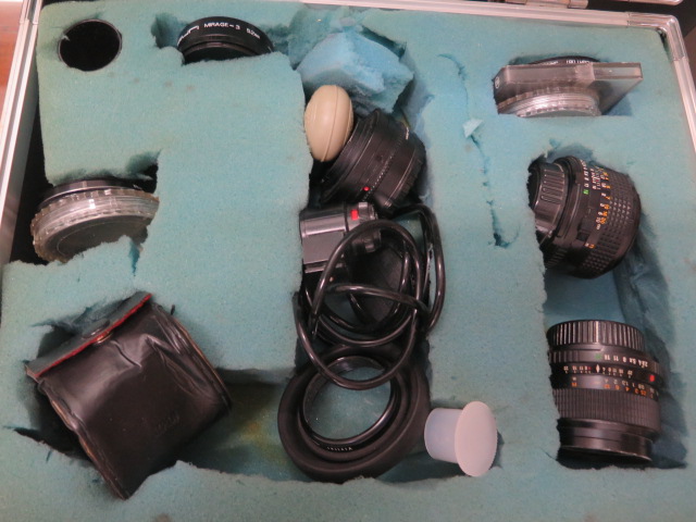 A collection of four SLR cameras with assorted lenses: Minolta X-700, Nikon F55, Canon T70, - Image 2 of 4