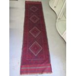 A hand knotted woollen Meshwani runner, 257cm x 64cm