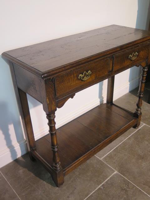 A 19th century oak side table with two drawers and an undertier, 84cm tall x 97cm x 41cm, with - Image 3 of 4