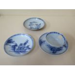 Two Nanking Cargo saucers and a teabowl and saucer, all with Christies labels and in good condition,