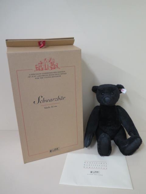 A Steiff Schwarzbar, mohair, 35cm tall, Limited Edition number 746 of 1500, boxed with outer box and