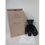 A Steiff Schwarzbar, mohair, 35cm tall, Limited Edition number 746 of 1500, boxed with outer box and
