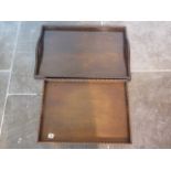 Two 1930's oak tea trays, longest 60cm x 40cm