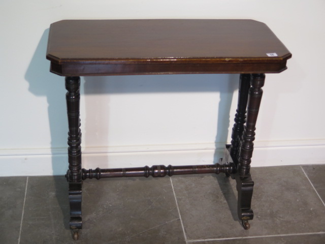 A Victorian mahogany stretcher table, 71cm tall x78cm x 38cm