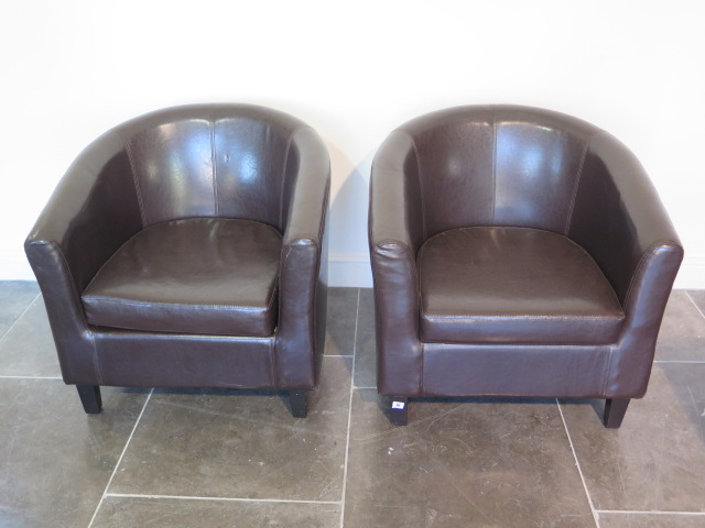 A pair of modern brown faux leather tub chairs, 73cm tall