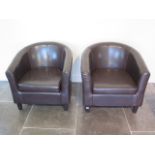 A pair of modern brown faux leather tub chairs, 73cm tall