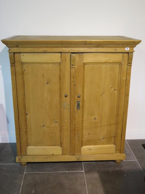 A 19th century pine continental two door cupboard, 130cm tall x 120cm x 59cm ideal kitchen cupboard